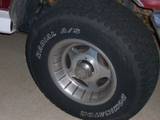 th_100_0435.jpg 16in center line wheel w/ 31in dominator tire