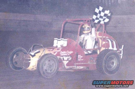 firstchecker.jpg Won a heat with me at the wheel 1977