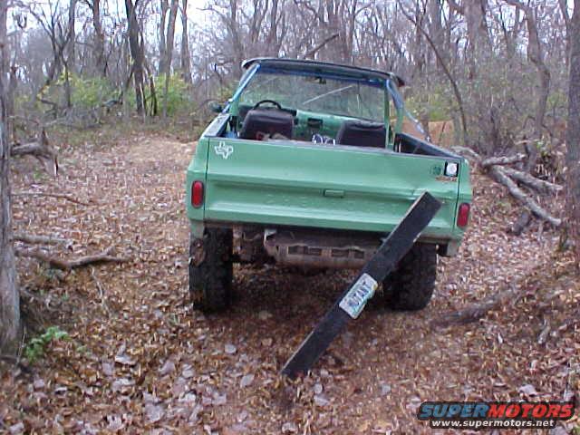 mvc490s.jpg rear bumper bolt pulls threw frame hole and digs into ground, causing the opposite side to crease my tailgate