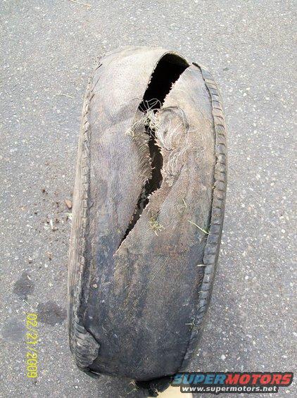 100_0105.jpg BLOWN TIRE