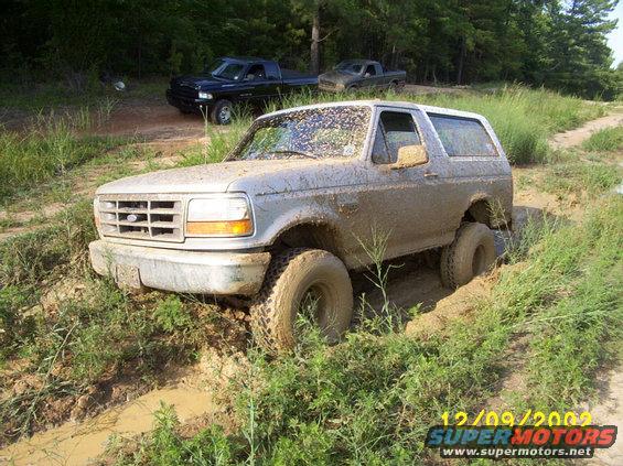 almost-out.jpg After jamming the majority of the local forest into the ruts, I was able to drive it out.