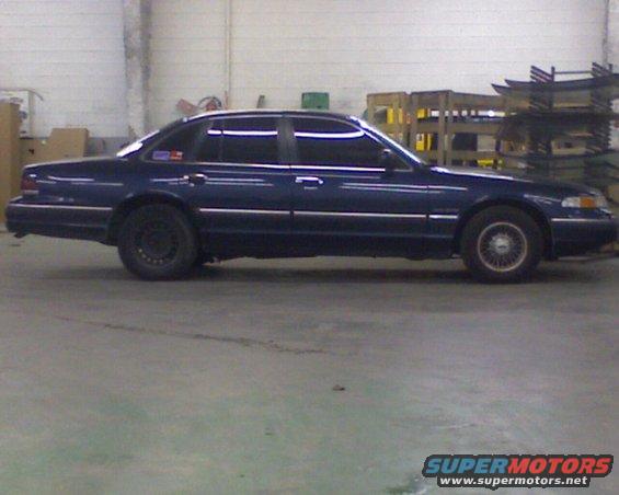 photo_122308_003.jpg lookin mean. rear tires are off a grand marquis to fit 1.5" wider tires in the rear. 