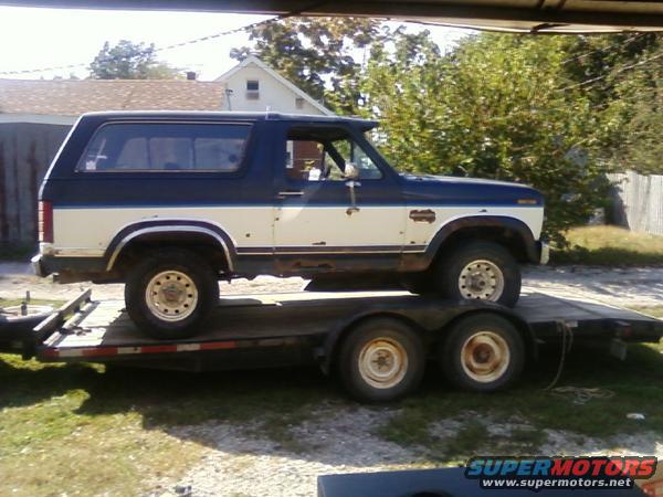 bronco-10.jpg another pic of her on the trailer after bringing her home with warped head