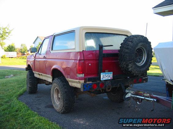 img_1490.jpg Drivers rear corner shot.  Rear bumper has swing away tire carrier and hitch.