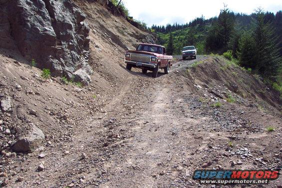 dcp_0039.jpg Jim working his way around a slide on the road out.