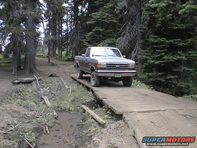 01010020.jpg Crossing the bridge at entrance of the trail to Funny Rocks & Moon Rocks play areas.