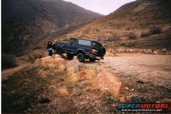 13_4.jpg Here's me with the girl posing on a rock.   This is when I still had 31's cooper highway tires lol. 