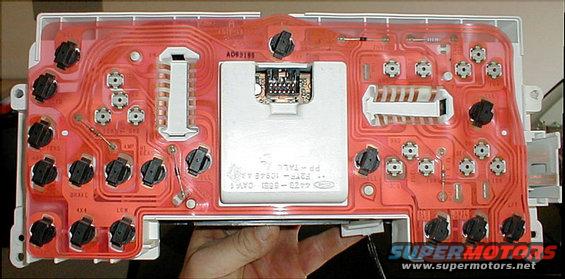 clustertach.jpg Instrument cluster ('94-96) film circuit with tachometer
IF THE IMAGE IS TOO SMALL, click it.

The recessed black connector in the middle is the PSOM.  The resistor at the top R is for the oil gauge. The black component to its L is a diode.