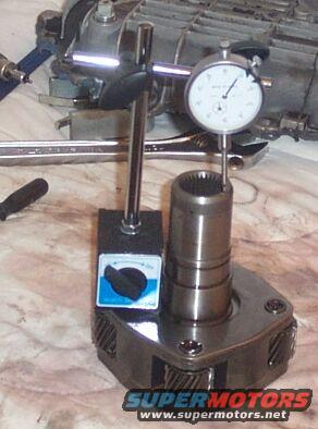 bw13562-046.jpg Checking play in the planetary assy, movement should not exceed 60/1000.  See this:  http://www.atra-gears.com/gears/sep01/taming.html