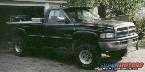 leveldodge.jpg My brother added a leveling kit and fender flares to his 2500.  I think it looks sweet now.