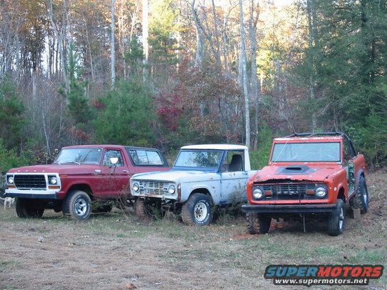 october-2009-002.jpg Over 2 years sitting in the back yard, The orange 73' is for parts.. The 69 has a dana 30 (drum) front end. I will use the dana 44 from the orange one and convert to disc brakes. 
