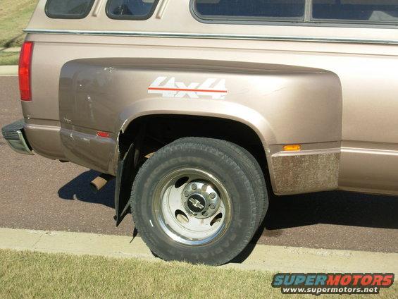 13rhrflare.jpg The cracks in the fiberglass wheelwells are very minor, and don't shake or rattle.

SOLD
1997 Chevy K3500 Silverado 205Kmi 4WD 1-ton dually

E-mail me thru my profile here or search CraigsList Memphis.
NEVER WRECKED - NO MAJOR REPAIRS
Most service was done at the dealership.
- 6.5L TurboDiesel (no smoke/leaks/rattles/squeaks)
- 4L80-E
- 4.10 PosiTrac
- Light Autumnwood (camper matches)
- tilt cruise cassette PW/PL/PM/RKE
- leather steering wheel & shifter
- autodimming compass RV mirror
- single 34 gal tank
- new Curt Class V hitch receiver 
- factory skid plates (no scars)
- 7 Michelin X-Radials LT225/75R16
- 2 new batteries 2012 with stainless studded terminals

New Dorman LLT FSD 2013
Reman HydroBoost 2012
New injection pump 2010
New drivebelt 2010
New driver's inside door handle 2012
Trans flush 2010
New rear brake cylinders & shoes, axle seals 2010
New A/C compressor
New master cylinder 2009
New vacuum pump 2005
Ball joints & pitman arm 2004