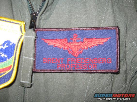 helmet-and-jumpsuit-(5).jpg And my personalized naval aviator name badge with wings and callsign.  