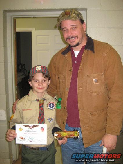 pinewood-derby-2112011-091.jpg Won best workmanship. I truly think others should of got this but there were several other awards given to others for various things,