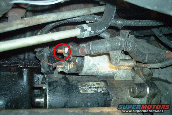 im000435.jpg Remove the red ground wire (circled) and the solenoid relay wire (thin red) from the starter.