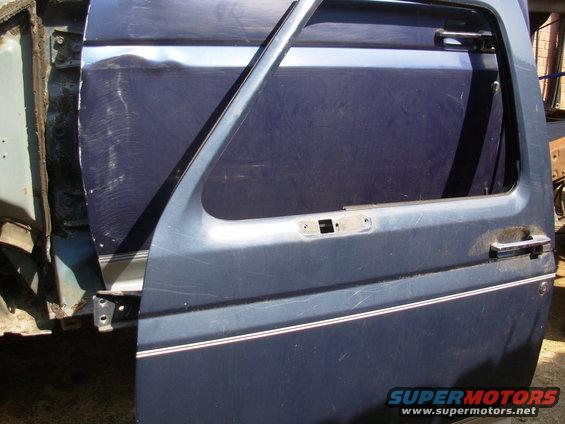 123doorcolorsl.jpg This '93 Bronco door is MX (Dark Shadow Blue Metallic), which isn't quite as purple as this truck's LA (Royal Blue Metallic).