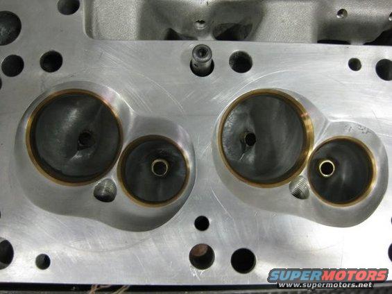 60cc40.5cc.jpg both the 60cc standard chamber and the shallow 40.5cc 'drop' chamber side by side in the same head