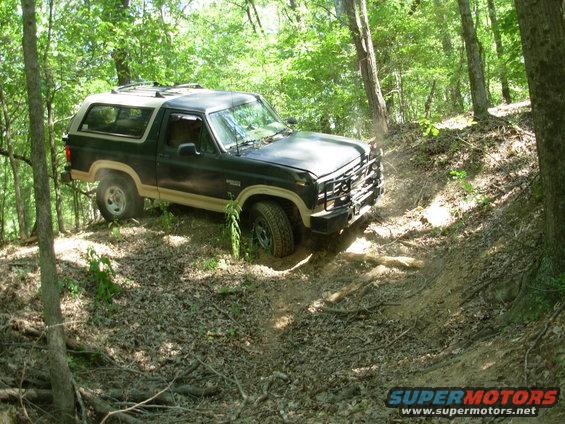 110828unstuck4.jpg This turn is hairy because there's nothing to gauge "level" from, other than the trees, and it's a tight turn into a blind dropoff, making it off-camber.