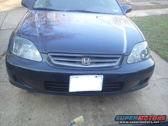 20111210-10.43.27.jpg Front end with the the new headlights, before I painted the faded grill.