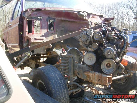 58hoisted.jpg I didn't design the crane in the dually for this, but by swapping to a longer boom, it worked perfectly.  I would have had to unload the Bronco on pavement to use my regular engine hoist, and then load the engine into the dually to haul off.  This was nearly 1 step - I had to set it down on the trailer for a minute to swap back to the short boom and then swing it into the bed.

See also:
[url=http://www.supermotors.net/registry/22771/78471-4][img]http://www.supermotors.net/getfile/902367/thumbnail/46engine.jpg[/img][/url]