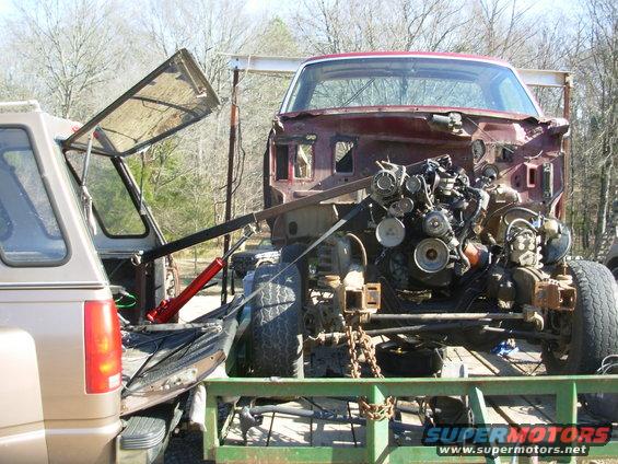 36engine.jpg I kicked it off into the deep end: the test-run is a complete 5.8L engine with a full torque converter (because the engine threw a rod), and I didn't feel like unloading the Bronco from the trailer to use a regular engine hoist.  I even had to swap a longer boom on to reach the engine, and back the t/g onto the trailer.