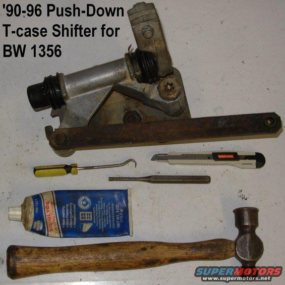 01.jpg This style of shifter is known to seize & break, and its proper use isn't intuitive (despite the instructions molded into the knob), so it commonly breaks when used after a long period of disuse.  To clean & lubricate it, first disconnect the transfer case end of the link bar with a prybar between the link bar and the t-case lever.  The bushing simply snaps onto & off of the nipple on the lever.  Then loosen the pinch bolt, and raise the upper shift lever.  It's NOT necessary to remove the shifter boot from the floor, and since the screw wells commonly fill with dirt, just leave it.  Then remove the pivot bolt from the top of the shifter (1&quot; or T-55) and lower the assembly.  It's also NOT necessary to remove the detent plate, but it & the shifter assembly should be cleaned with degreaser (Simple Green or Purple Power) and a stiff-bristle brush.

[url=http://www.supermotors.net/registry/media/901992][img]http://www.supermotors.net/getfile/901992/thumbnail/tcaseshifterbezel.jpg[/img][/url]

Recently, Dorman has begun offering this shifter as 600-602; ~$90 on [url=http://www.amazon.com/Dorman-600-602-Shift-Linkage-Truck/dp/B003SZ3COU/]Amazon[/url].  The steel link bar, which is specific to the t-case type, is not included.  The plastic bushings are in [url=https://www.amazon.com/dp/B000CO76QA/]this kit[/url], along with a clutch MC pushrod eye bushing.