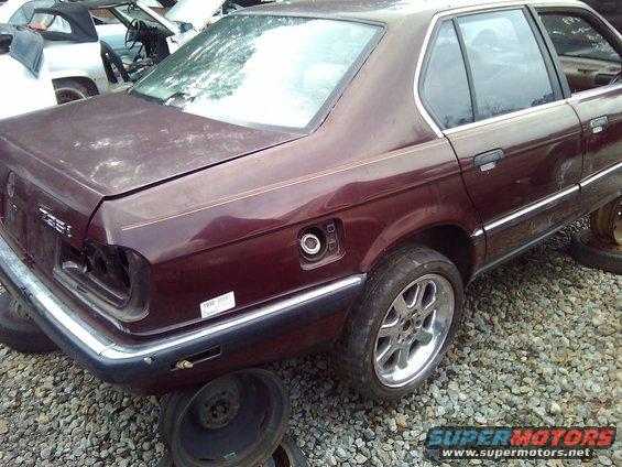 735i-with-bugatti.jpg Just a regular 735i in the junk yard, but take a closer look