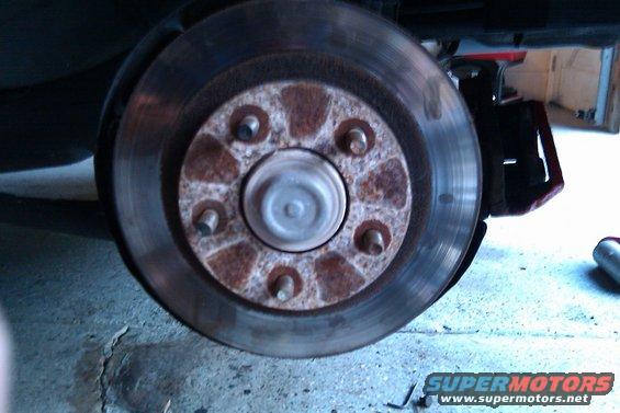 012.jpg Stock front brake rotors.