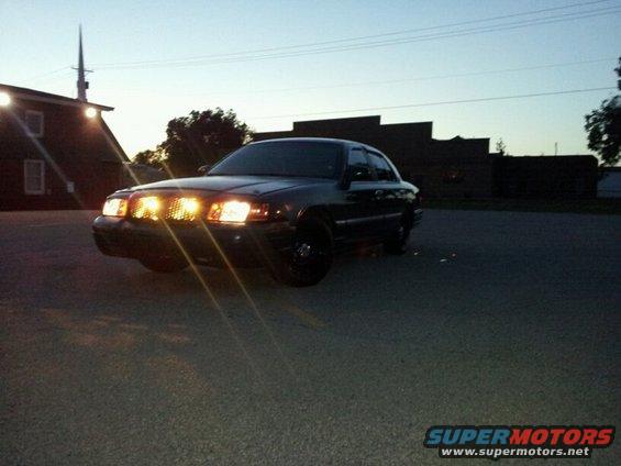 127.jpg likin the new fog lights in the grill. gives it more of a cop look during the day