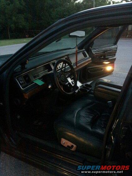 132.jpg interior completely changed. black panels with dark green seats. much better.