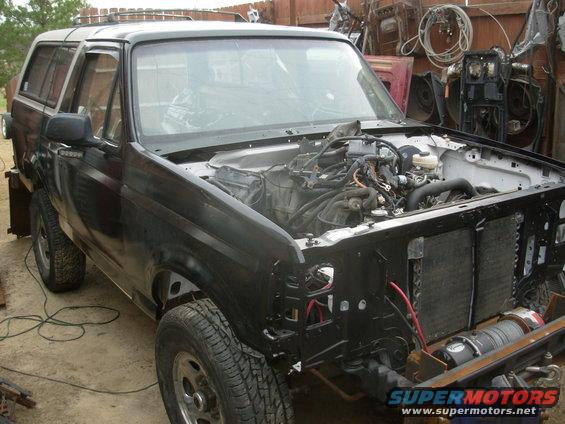 28fender.jpg Just getting the fenders out of the way temporarily.

That's the '93 engine bay wiring harness piled on the engine.  I haven't even started on its mods...