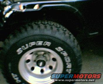 dec06230.jpg The Micky Thompson Classic rims and 33x12.50 All sport Mudd terrain tires