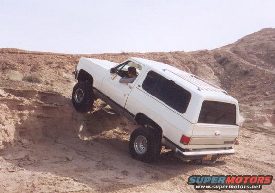 k5-climbing-up.jpg the weenie war of the day was between this guy and i he is lifted on 33's.  (i won basically just becuase i care less about my sheet metal)