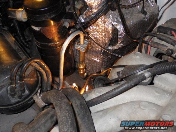 40compunion.jpg This was the last hurdle in bastardizing my A/C system.  Most of it is '94-96 R134a parts, but that evaporator wouldn't fit in the '93 outside HVAC box, and I didn't feel like buying the other box just to end up with this one as a spare.  So to connect the parallel-flow condenser's Aluminum liquid line with a small garter spring fitting, I had to attach the mating part of an R134a evaporator to my (larger) R12 evaporator.  I cut both of them, and used a common 1/2&quot; compression union.  It should be fine since the peak pressure here is only about 100psi (when OFF; running pressure is closer to 25psi).  But if it leaks, I'll disassemble it & add threadlocker or some other sealant.

UPDATE:  It worked for a while, and then quit.  So I pulled it out & did it the way I should have done originally, using a complete '94-96 4.9L A/C system from the JY.