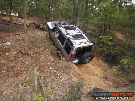 131010greg1.jpg Greg was anxious to try it next, but the D2's breakover angle wasn't high enough.  His rear bumper hit harder than Jon's had.